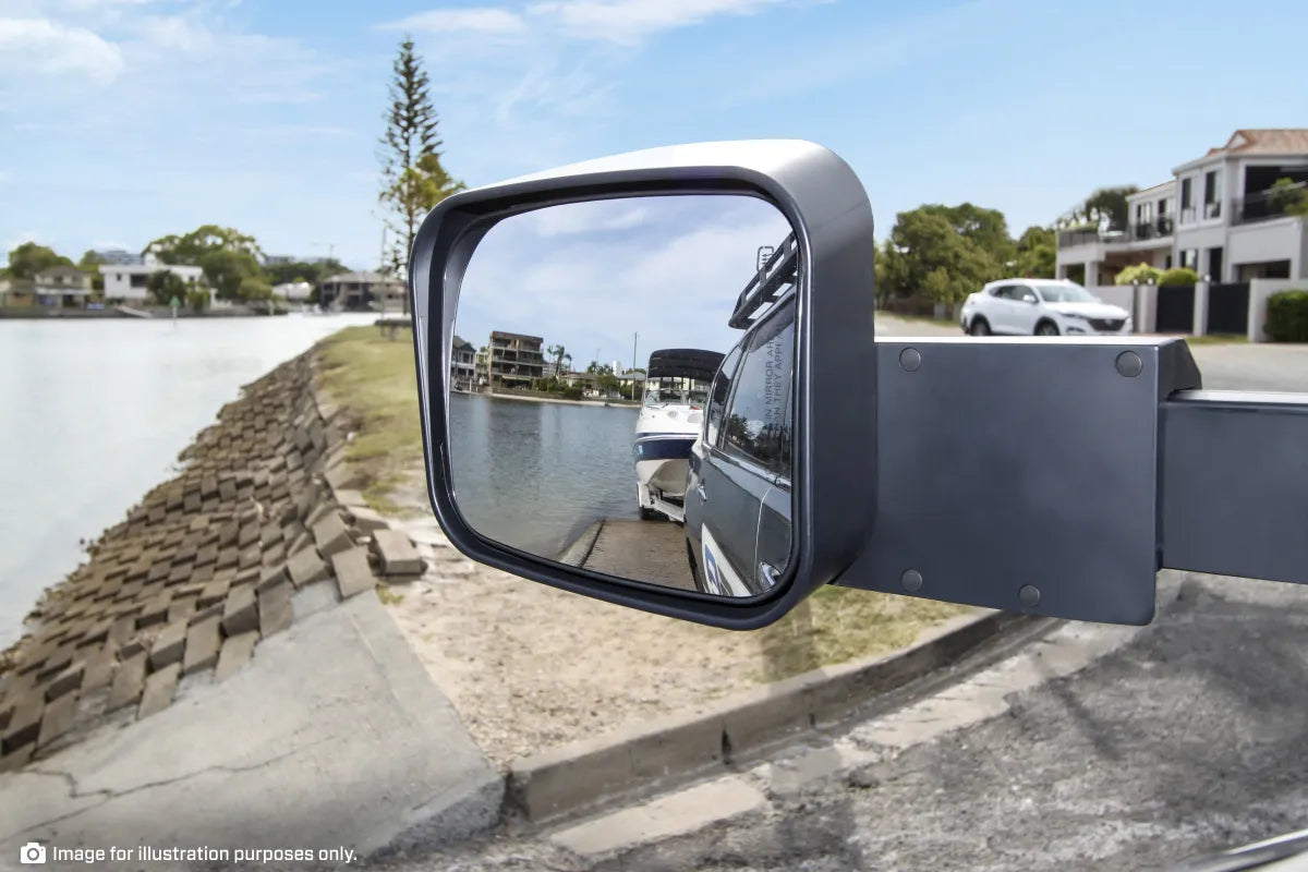 Why are extended towing mirrors so important when towing a caravan?